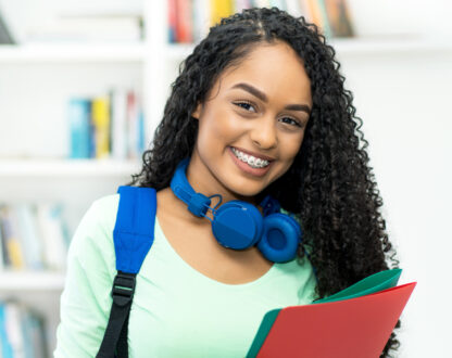 Beautiful smiling girl wearing dental braces in Markham, ON.